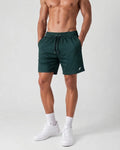 Pantaloneta Deportiva Verde Botella en Burda Fría para Hombre